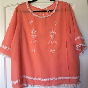 Peach blouse with lace details